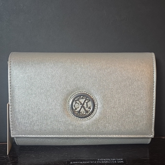 Christian Lacroix Handbags - Christian Lacroix Metallic Silver Clutch